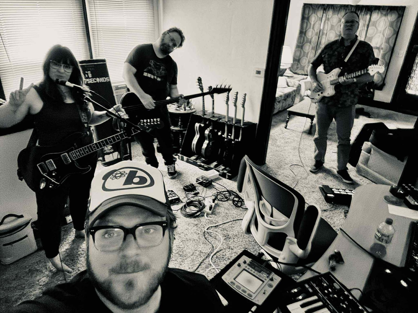 Dayton band Kittinger — Amber Heart (from left), Brian Greaney, Chris Corn, and Rich Reuter — named after USAF test pilot Colonel Joseph Kittinger, similarly explores the limits of what’s possible, but through analog synths, 1960s spy-pop guitars, and genre-blending basslines. CONTRIBUTED