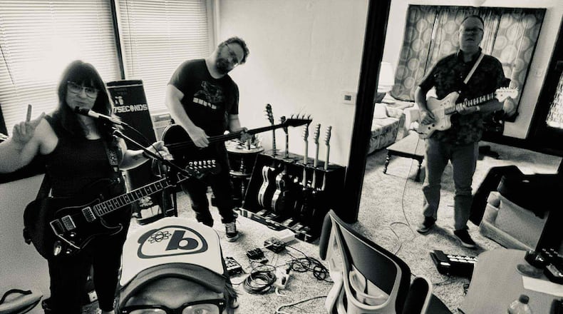 Dayton band Kittinger — Amber Heart (from left), Brian Greaney, Chris Corn, and Rich Reuter — named after USAF test pilot Colonel Joseph Kittinger, similarly explores the limits of what’s possible, but through analog synths, 1960s spy-pop guitars, and genre-blending basslines. CONTRIBUTED