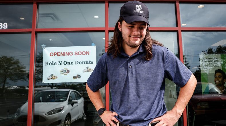 Luke Lawrence, 19, is shooting for Oct. 15 to open his new Hole N One doughnut shop on West Alex Bell Rd. Lawrence has been working in the doughnut business since he was 14 years old. After high school, Lawrence attended Sinclair College. JIM NOELKER/STAFF