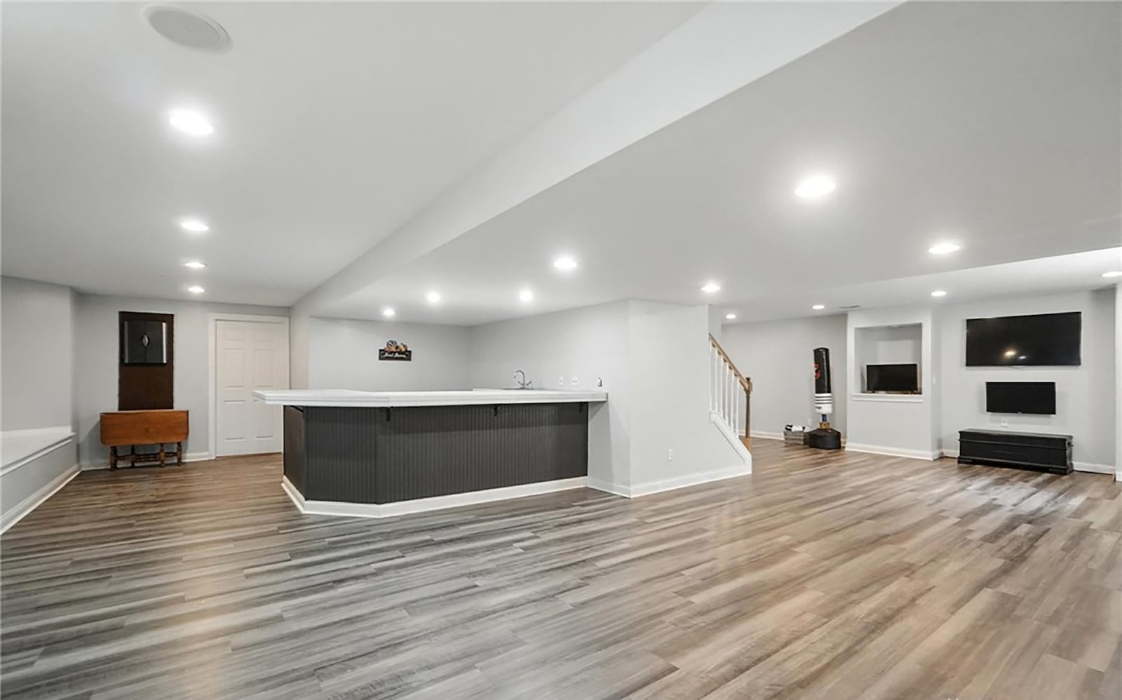 The finished basement has a rec room with built in rec bar and entertainment center. CONTRIBUTED