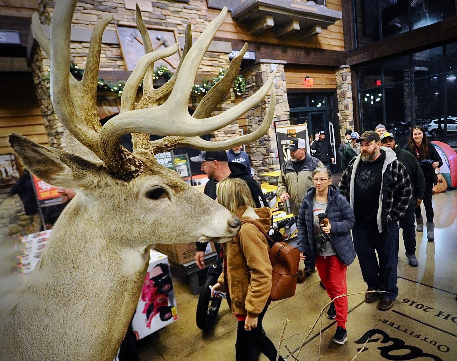 Black Friday shoppers looking for good deals pour into the Cabela’s in Centerville as soon as the doors open at 5 o’clock Friday morning November 25, 2022. MARSHALL GORBY \STAFF