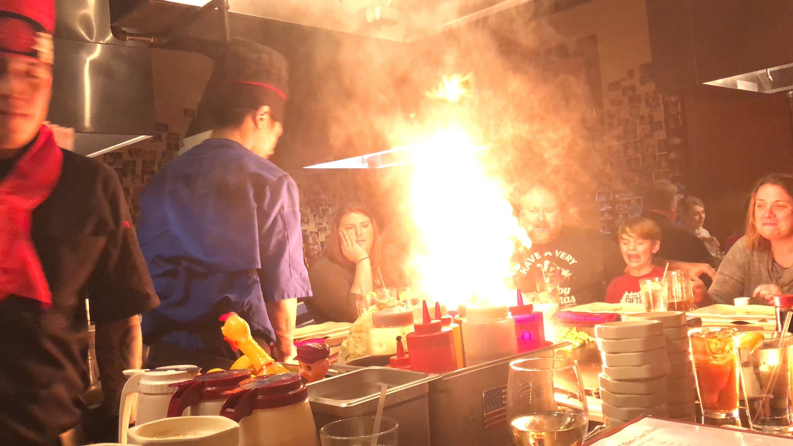 Dinner is the show at Osaka Japanese Steakhouse in Beavercreek near Dayton. The restaurant's  dinning room has several hibachi tables. Sushi and other Japanese favors are on the menu.  The walls are covered in hundreds of photos of customers celebrating anniversaries and birthdays.