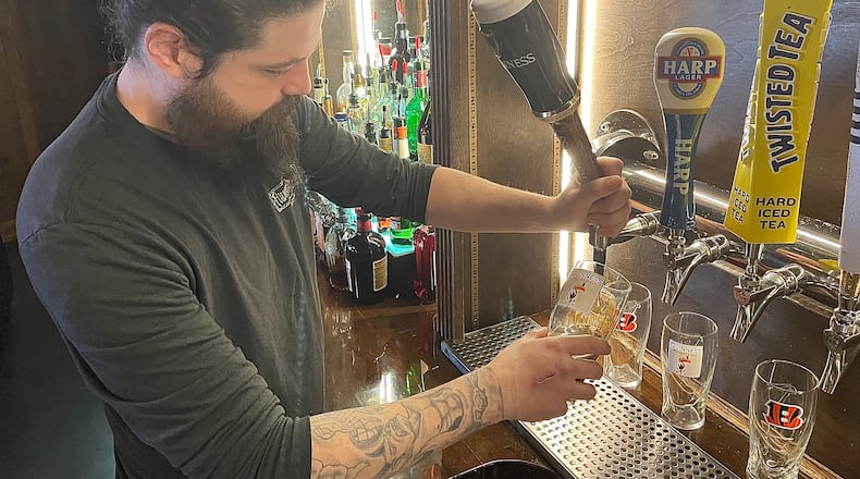 Restaurants near the University of Dayton like Flanagan’s Pub and Milano’s are expecting a “full house” during St. Patrick’s Day and Selection Sunday, followed by the NCAA First Four. NATALIE JONES/STAFF