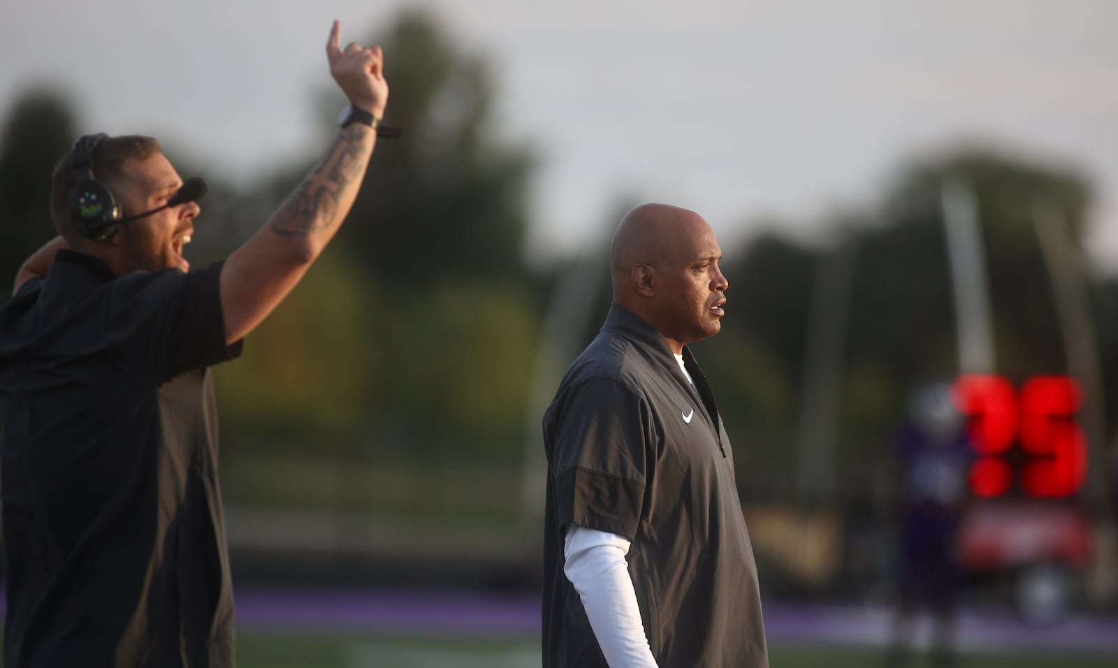 Wayne's Roosevelt Mukes, right, coaches during a game against Pickerington Central on Friday, Aug. 29, 2025, in Pickerington. David Jablonski/Staff