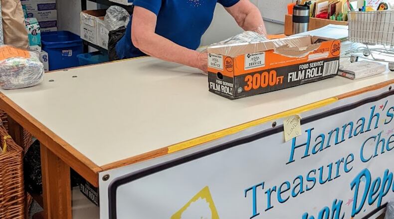 Linda, a diaper volunteer at Hannah's Treasure Chest, wraps diapers. The nonprofit is collecting diapers for local families in need. CONTRIBUTED