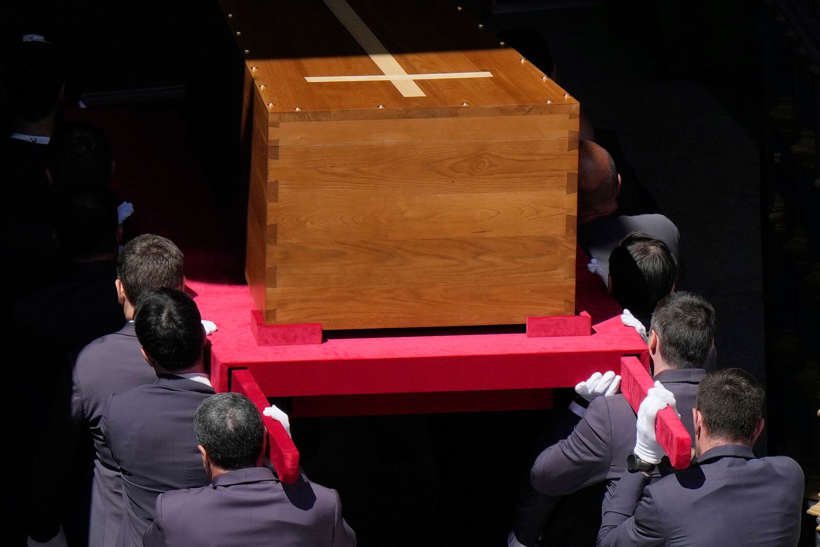 The coffin of Pope Francis is carried into St. Mary Major Basilica in Rome, Saturday, April 26, 2025. (AP Photo/Luca Bruno)