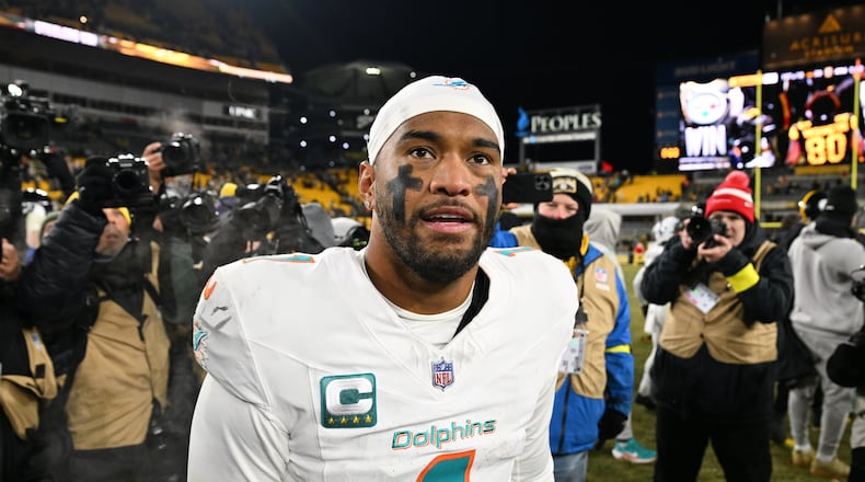 Miami Dolphins quarterback Tua Tagovailoa (1) walks off the field after an NFL football game against the Pittsburgh Steelers in Pittsburgh, Monday, Dec. 15, 2025. (AP Photo/Justin Berl)
