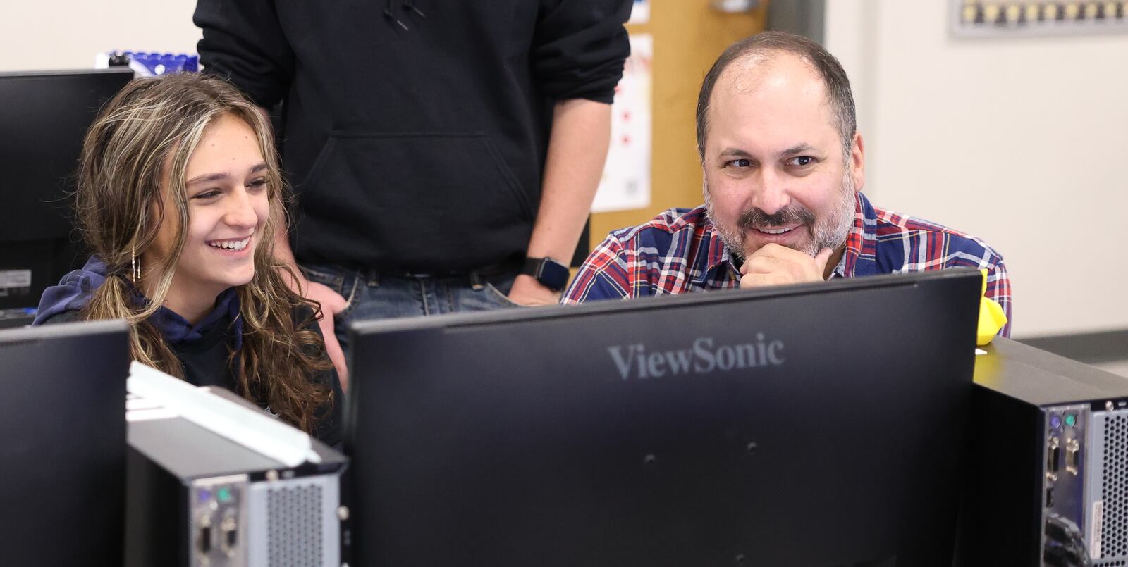 Doug Picard has been named a Dayton Daily News Community Gem for his work at Greene County Career Center, where he is an instructor. His class is working on a project retrofitting kid cars for hospitalized children. BRYANT BILLING / STAFF