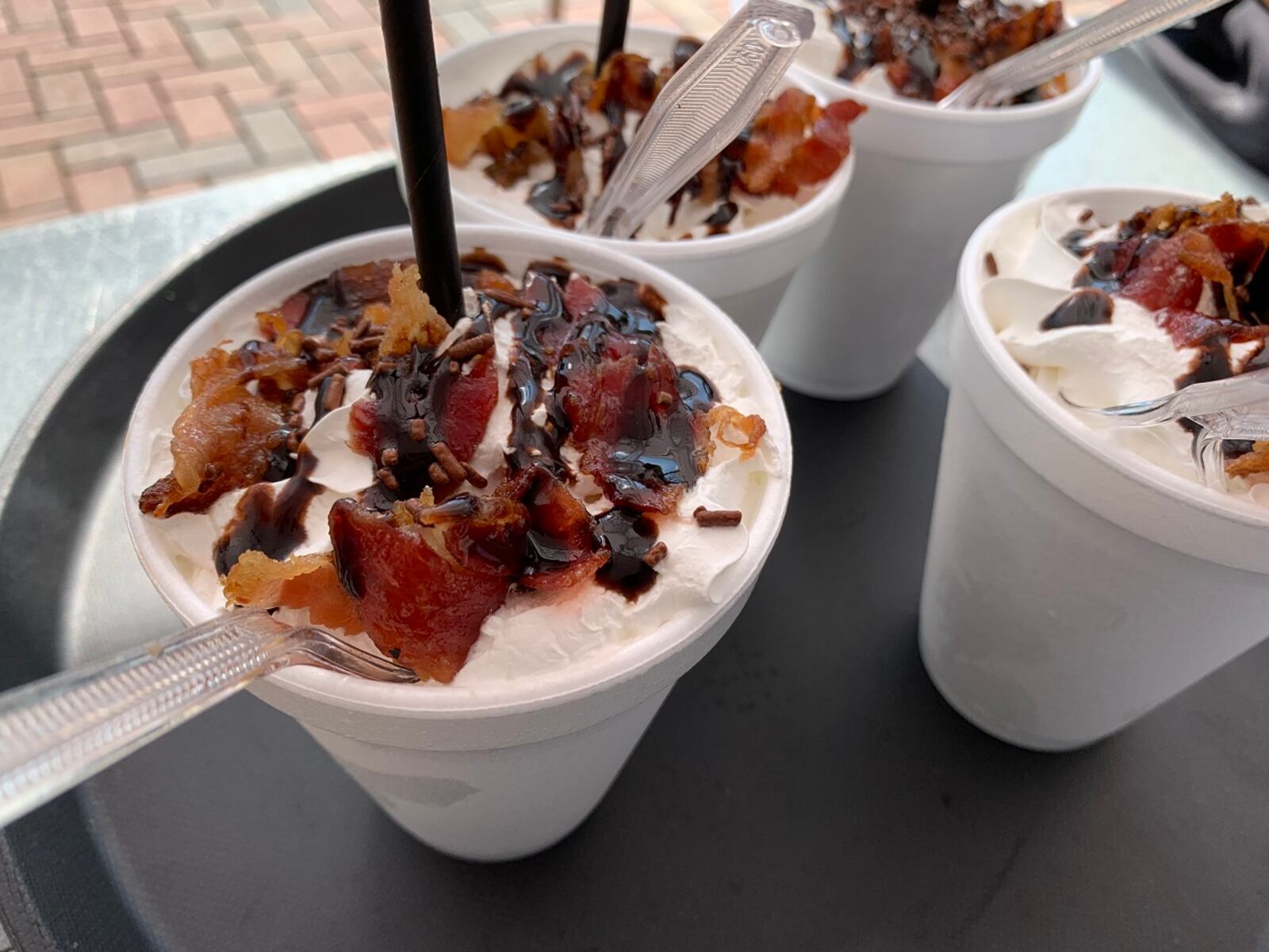 A festival featuring all things bacon including bacon wrapped turkey legs, bacon funnel cakes, chocolate covered bacon and much more is returning to the Fraze Pavilion on Saturday, Aug. 13. CONTRIBUTED/ALEXIS LARSEN