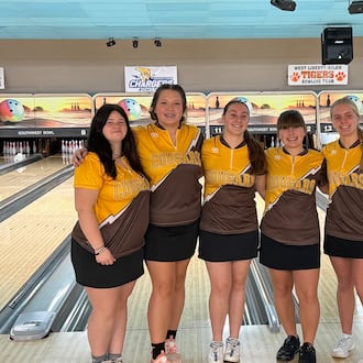 The Kenton Ridge team of seniors Shea Nicewaner, and Addie Duncan, junior Addi Hibbs, and seniors Addy Keplinger and Kenzie Stacy broke a school record in mid-December with 2,794. CONTRIBUTED
