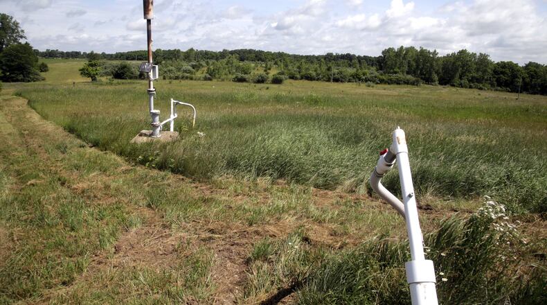 The Tremont City Barrel Fill just north of Springfield is one of several old industrial sites and landfills that pose potential threats to the massive underground aquifer because of underground toxic waste from factories. BYRON STIRSMAN / STAFF