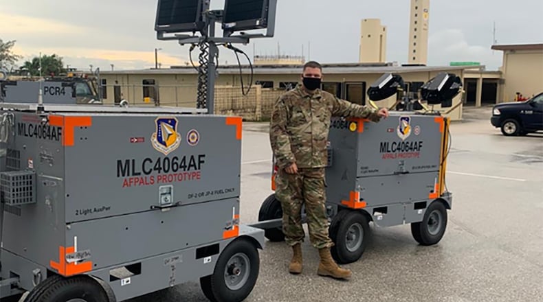 Staff Sgt. Ryan Merritt, 36th Maintenance Squadron, with the Advanced Flightline Power and Lighting System hybrid light cart prototype is shown in his role as the equipment custodian and evaluator during PACOM Valiant Shield 2020. COURTESY PHOTO