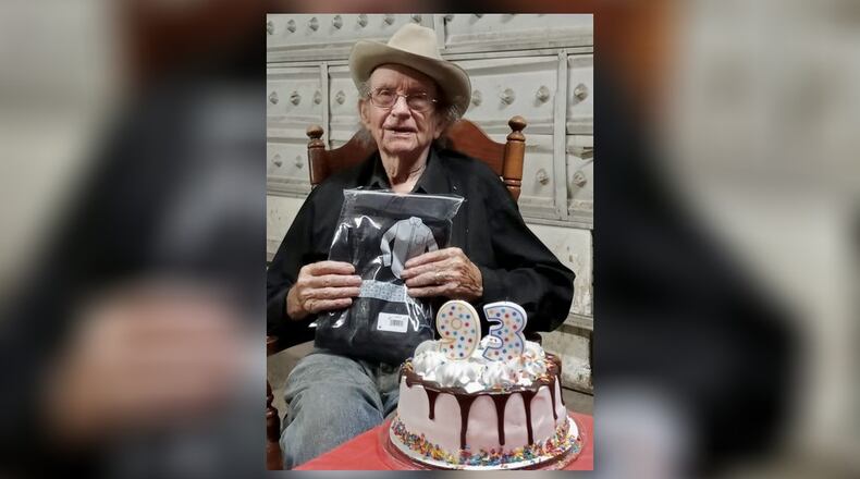 Pete Donegia, 94, of Moraine, shown celebrating his 93rd birthday, was beaten, bound and robbed during a Christmas home invasion at his home. His family is offering a $5,000 reward for information that leads to the arrest of the suspects. CONTRIBUTED
