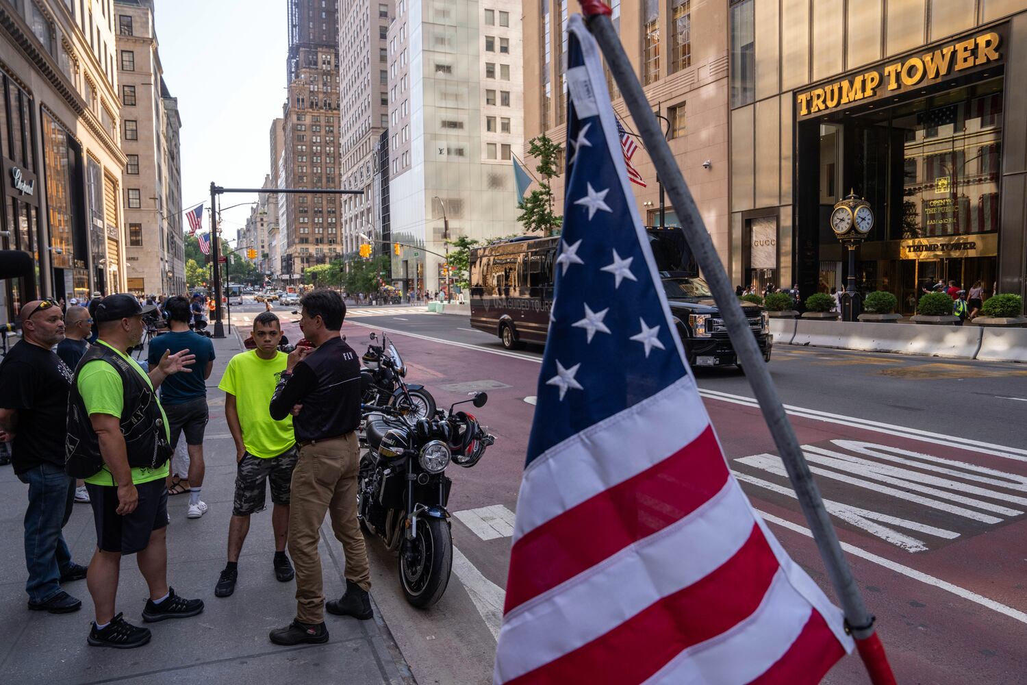 Supporters of former President Donald Trump gather across Fifth Avenue from Trump Tower in midtown Manhattan on Sunday morning, July 14, 2024, one day after Trump was shot while speaking at a campaign rally in Butler, Pa. (Adam Gray/The New York Times)