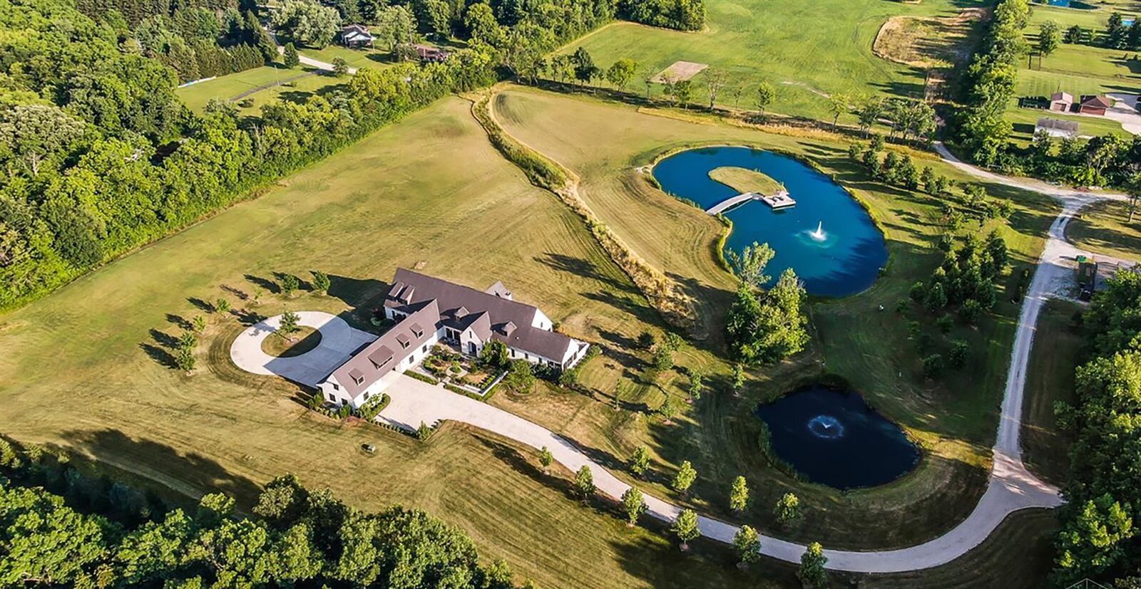 The property has two ponds, one with a dock and wood foot bridge. CONTRIBUTED