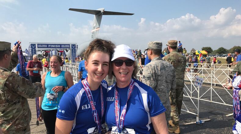 Colonel Melanie “M.J.” Ellis and daughter Zoe after Saturday’s Air Force Marathon. Tom Archdeacon/CONTRIBUTED
