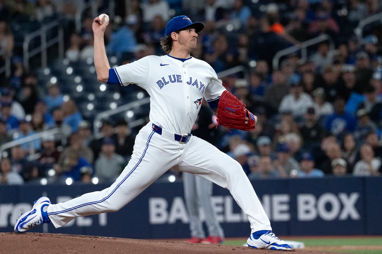 Toronto Blue Jays starting pitcher Kevin Gausman (34) throws to a Cleveland Guardians batter during the first inning of a baseball game in Toronto, Saturday, May 3, 2025. (Jon Blacker/The Canadian Press via AP)