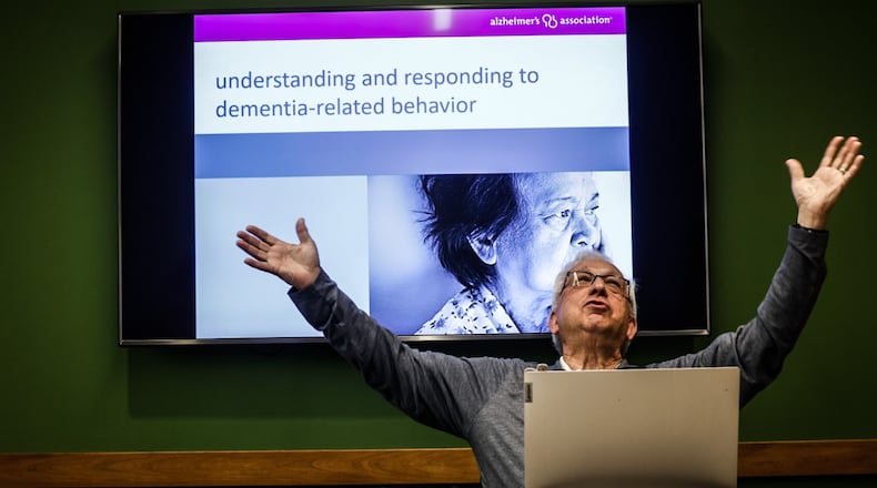 Community Educator for the Miami Valley Elsheimer's Association, Scott Griswold talks to a small group at the Wilmington-Stroop branch of the Dayton Metro Library Tuesday July 18, 2023, Griswold talked about understanding Dementia and Alzheimer's research. JIM NOELEKR/STAFF
