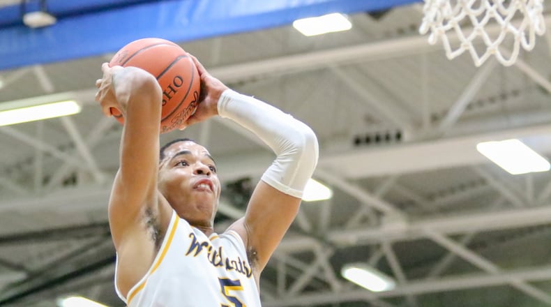 Springfield High School senior Ra’Heim Moss had 18 points in a sectional-final defeat of Sidney. CONTRIBUTED PHOTO BY MICHAEL COOPER