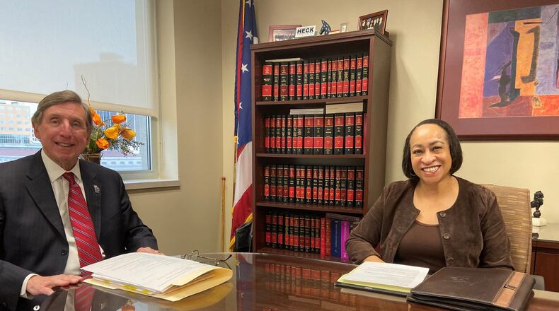 Montgomery County Prosecutor Mat Heck Jr., left, and Sandy Hunt, director of the Montgomery County Prosecutor’s Office Victim-Witness Division. The division was created in 1974 to help victims and witnesses of violent crimes. Hunt and her team have been working with Oregon District shooting victims and families since the Aug. 4 massacre. ISMAIL TURAY JR./STAFF