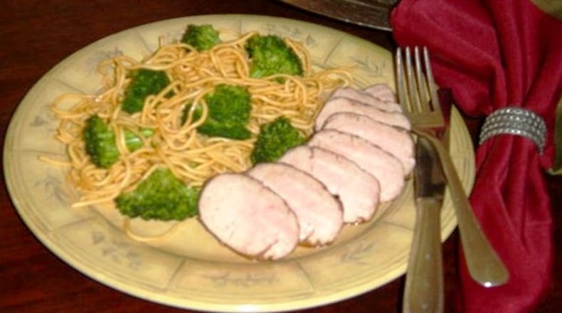 Asian-Flavored Pork Tenderloin with Stir-fried Broccoli and Noodles. (Linda Gassenheimer)