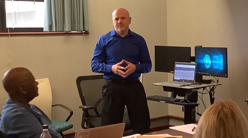 Bill Miles educates unit training managers on the Education and Training Management System system. Contributed photo