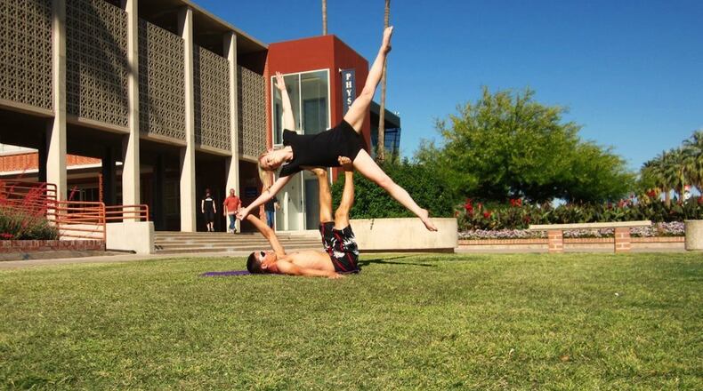 Side Flying pose with Austin Rivera and Chelsea Carey. CONTRIBUTED