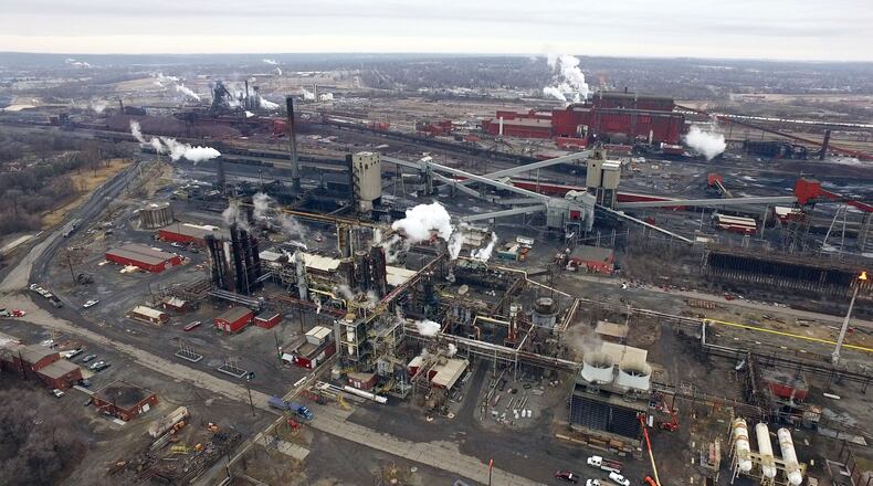 Aerial view of the AK Steel Middletown Works.  The big steel producer covers more than 2,700 acres in the city to operate coke ovens, a blast furnace, hot strip mill and more than a dozen other steel production related processes.   TY GREENLEES / STAFF