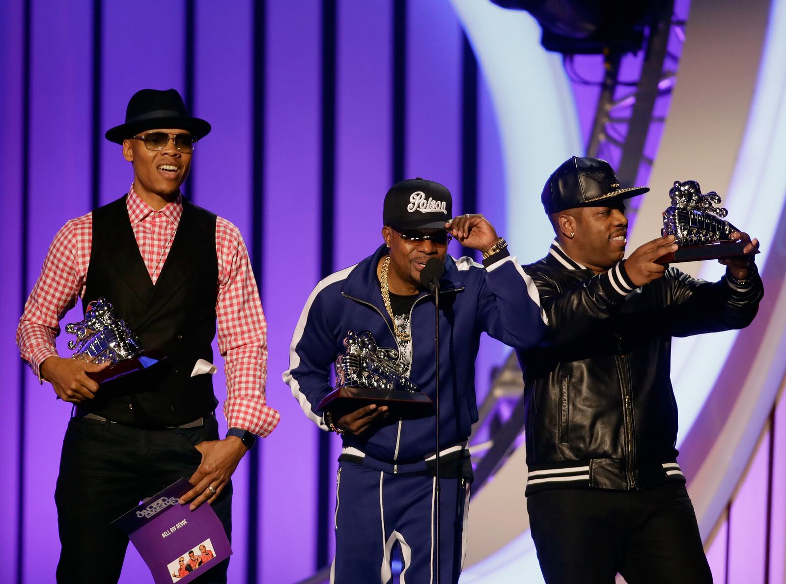 LAS VEGAS, NV - NOVEMBER 05:  (L-R) Ronnie DeVoe, Ricky Bell, and Michael Bivins of Bell Biv DeVoe accept the Soul Train Certified Award  onstage at the 2017 Soul Train Awards, presented by BET, at the Orleans Arena on November 5, 2017 in Las Vegas, Nevada.  (Photo by Isaac Brekken/Getty Images for BET)