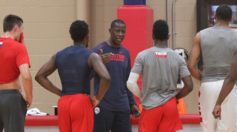 Daytons Anthony Grant talks to players during practice at the Cronin Center on Tuesday, July 31, 2018, in Dayton. David Jablonski/Staff