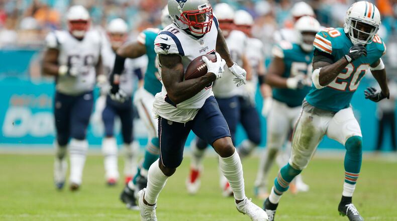 MIAMI, FL - DECEMBER 09: Josh Gordon #10 of the New England Patriots carries the ball durig the second half against the Miami Dolphins at Hard Rock Stadium on December 9, 2018 in Miami, Florida. (Photo by Michael Reaves/Getty Images)