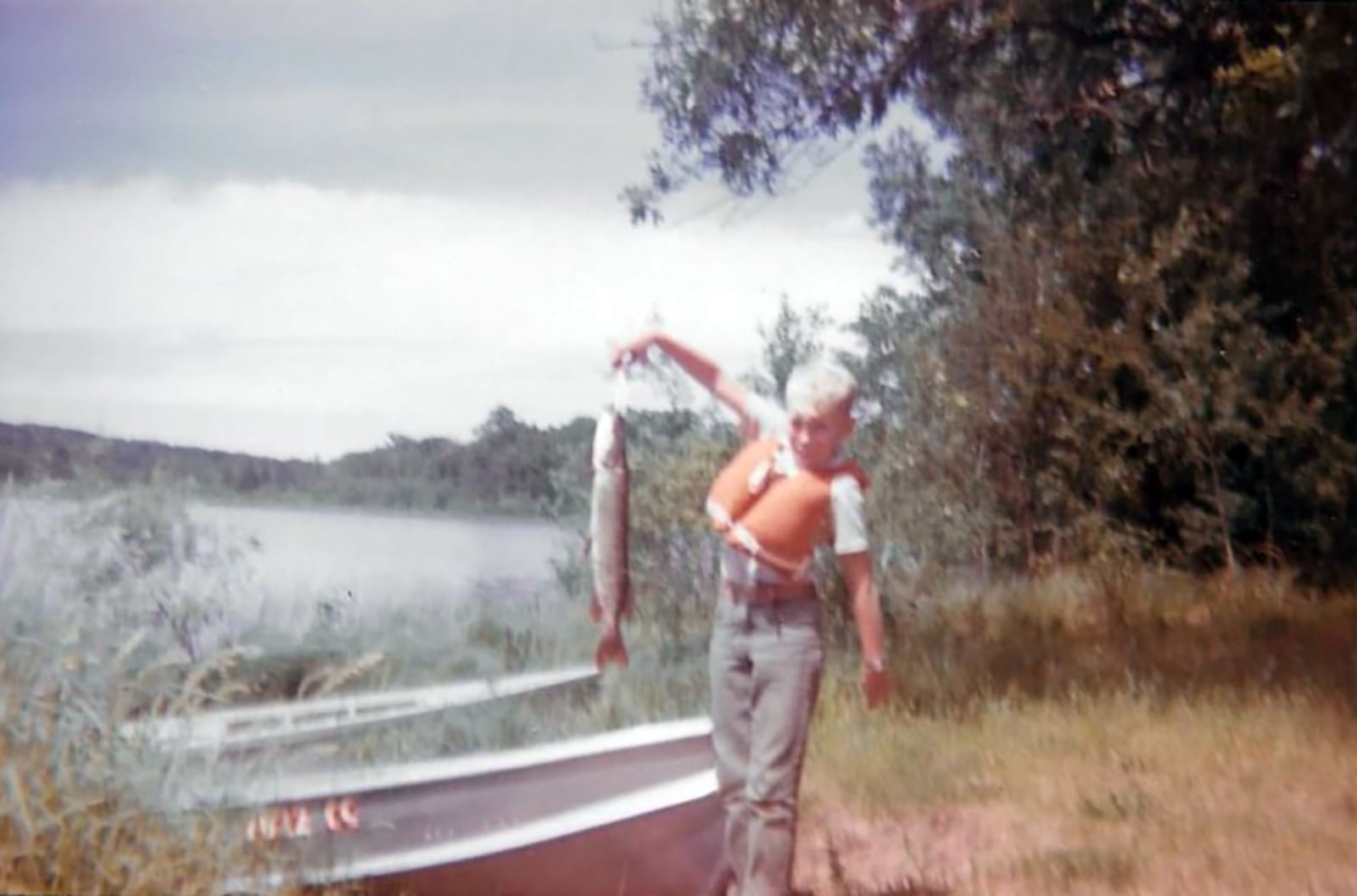Scott Arentsen developed his love of travel as a boy. He is shown in the early 1960's fishing in Wisconsin.