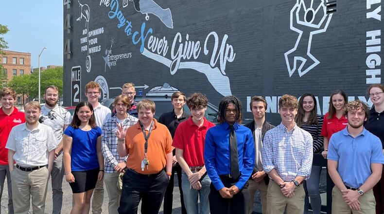 A group of interns smiles for a photo in front of the Wright Brothers Institute's downtown Dayton location Aug. 10. These students are participants in the Air Force Research Laboratory’s "Summer of Innovation - Digital Drone" program. CONTRIBUTED PHOTO