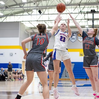 Carroll beat Goshen and Bellbrook beat Monroe to win Division III district titles on Saturday, Feb. 28, 2026 at Springfield High School. MICHAEL COOPER / STAFF