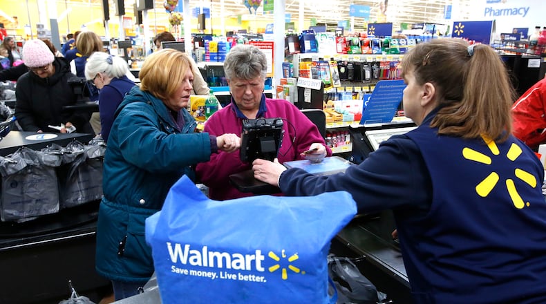 Wal-Mart is teaming up with a department store to form an “anti-Amazon” coalition of retailers, the WSJ reports. TY GREENLEES / STAFF