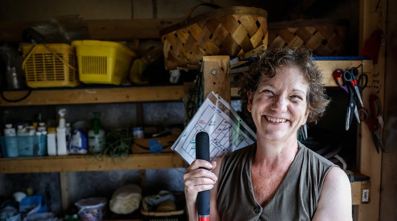 Sue Sack said she started giving Catholic Social Services extra eggs from her farm about 30 years ago. Her efforts have grown to creating gardens at St. Paul Catholic Church and Aullwood Garden MetroPark in Englewood, and the St. Helen Parish in Riverside. JIM NOELKER/STAFF