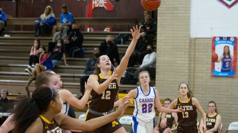 Alter's Karlie Romer shoots during the second half of Wednesday night's 51-27 victory at Carroll. Jeff Gilbert/CONTRIBUTED
