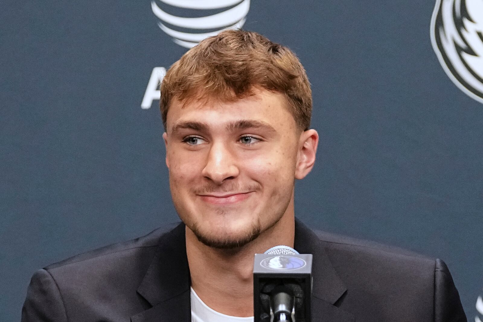 Dallas Mavericks' Cooper Flagg, the No. 1 overall pick in the NBA draft, takes questions during an NBA basketball press conference at the team's practice facility, Friday, June 27, 2025, in Dallas. (AP Photo/Tony Gutierrez)