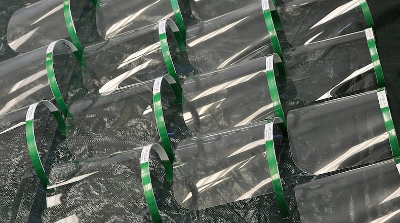 Face shields wait to be assembled at MRL Medical, a Beavercreek defense contractor. MARSHALL GORBYSTAFF