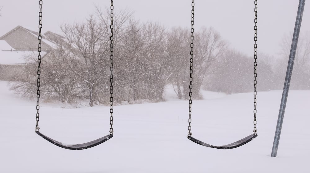 About eight inches of snow had fallen in Meadowpoint Park in Troy as of 1 p.m. BRYANT BILLING / STAFF