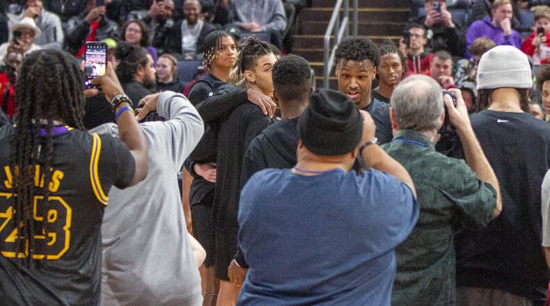 Bronny James was surrounded by about 50 photographers during player introductions before his Sierra Canyon team played Akron St. Vincent-St. Mary on Saturday at Nationwide Arena. CONTRIBUTED/Jeff Gilbert
