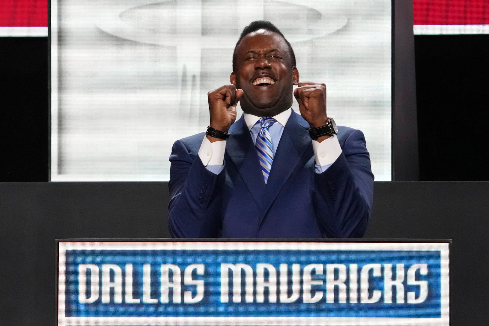 Dallas Mavericks' Rolando Blackman celebrates after NBA Deputy Commissioner Mark Tatum announced that the Mavericks won the first pick in the NBA basketball draft lottery in Chicago, Monday, May 12, 2025. (AP Photo/Nam Y. Huh)
