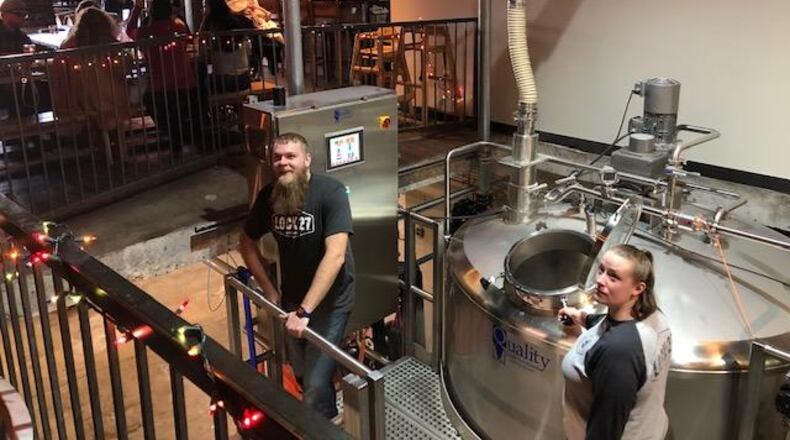 Lock 27 Brewing, which operates in downtown Dayton and Centerville, has released a handful of its beers in cans at its brewpubs and is gearing up for broader distribution of some of its core beers in six-packs of 12-ounce cans in early 2019. MARK FISHER / STAFF PHOTO