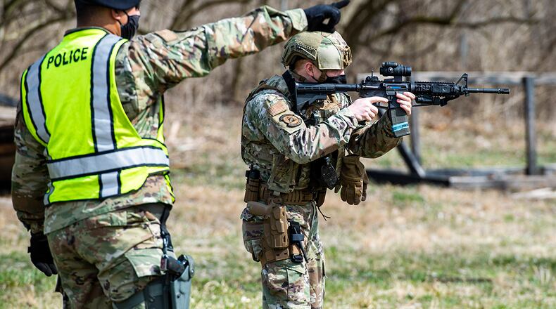 Staff Sgt. Jacob Reyes, 88th Security Forces Squadron unit training instructor, gives SFS “Defenders” a safety brief prior to conducting sustainment training with M4 carbine rifles and M18 pistols at Wright-Patterson Air Force Base in 2021. U.S. AIR FORCE PHOTO/WESLEY FARNSWORTH