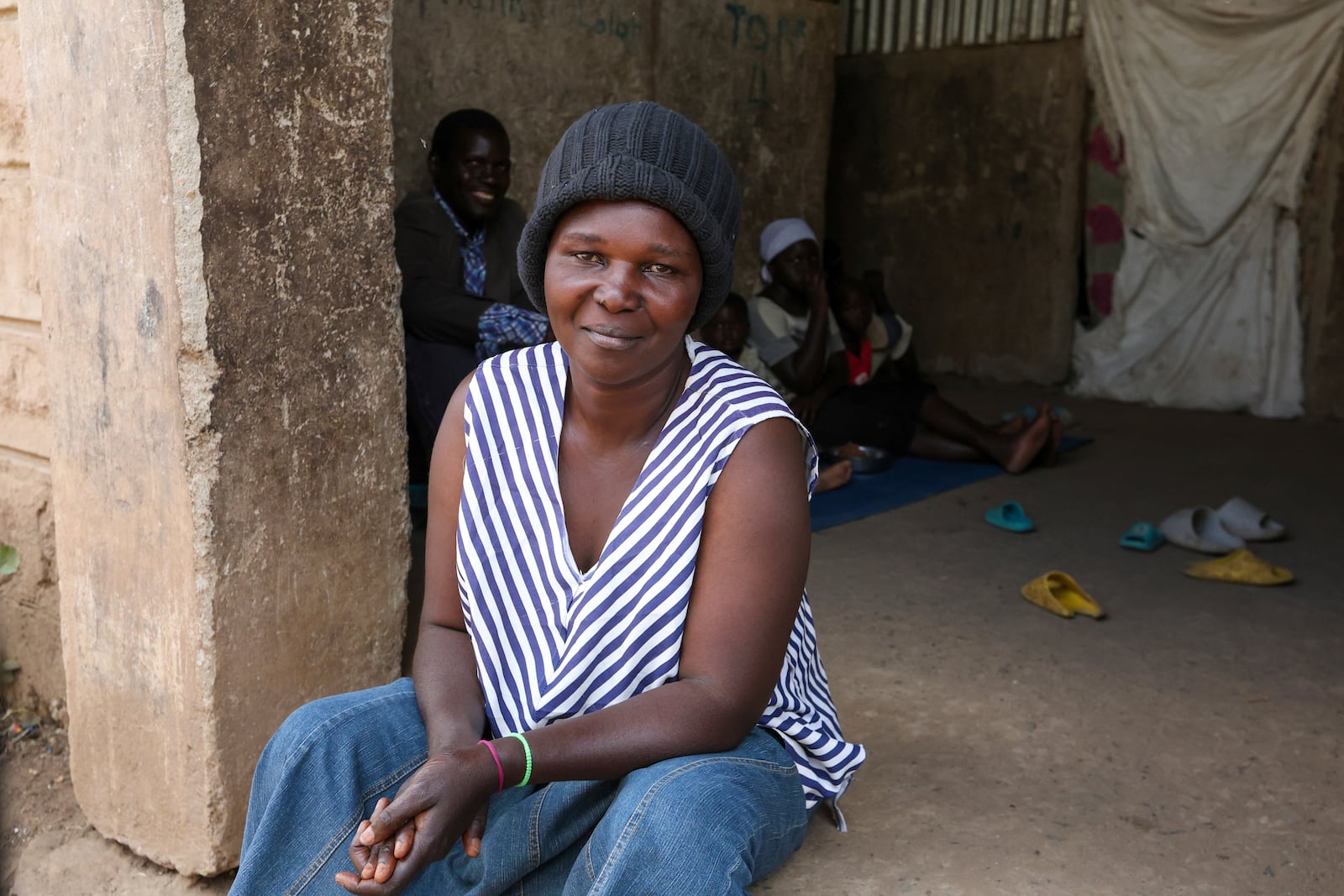 Aujene Cimanimpaye, from the Democratic Republic of Congo, poses for a photograph at the Kakuma Refugee Camp in Turkana County, Kenya, Wednesday, June 4, 2025. (AP Photo/Andrew Kasuku)
