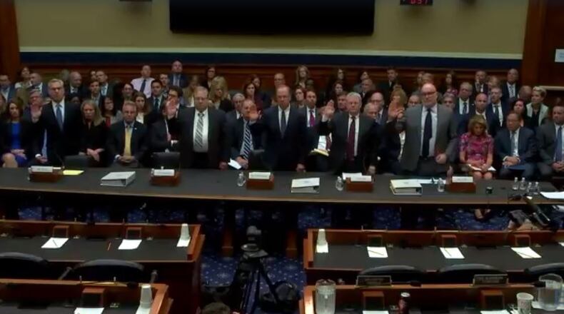 Five drug distributor executives are sworn in under oath before testifying before a Congressional oversight committee about the opioid crisis in West Virginia. CONTRIBUTED