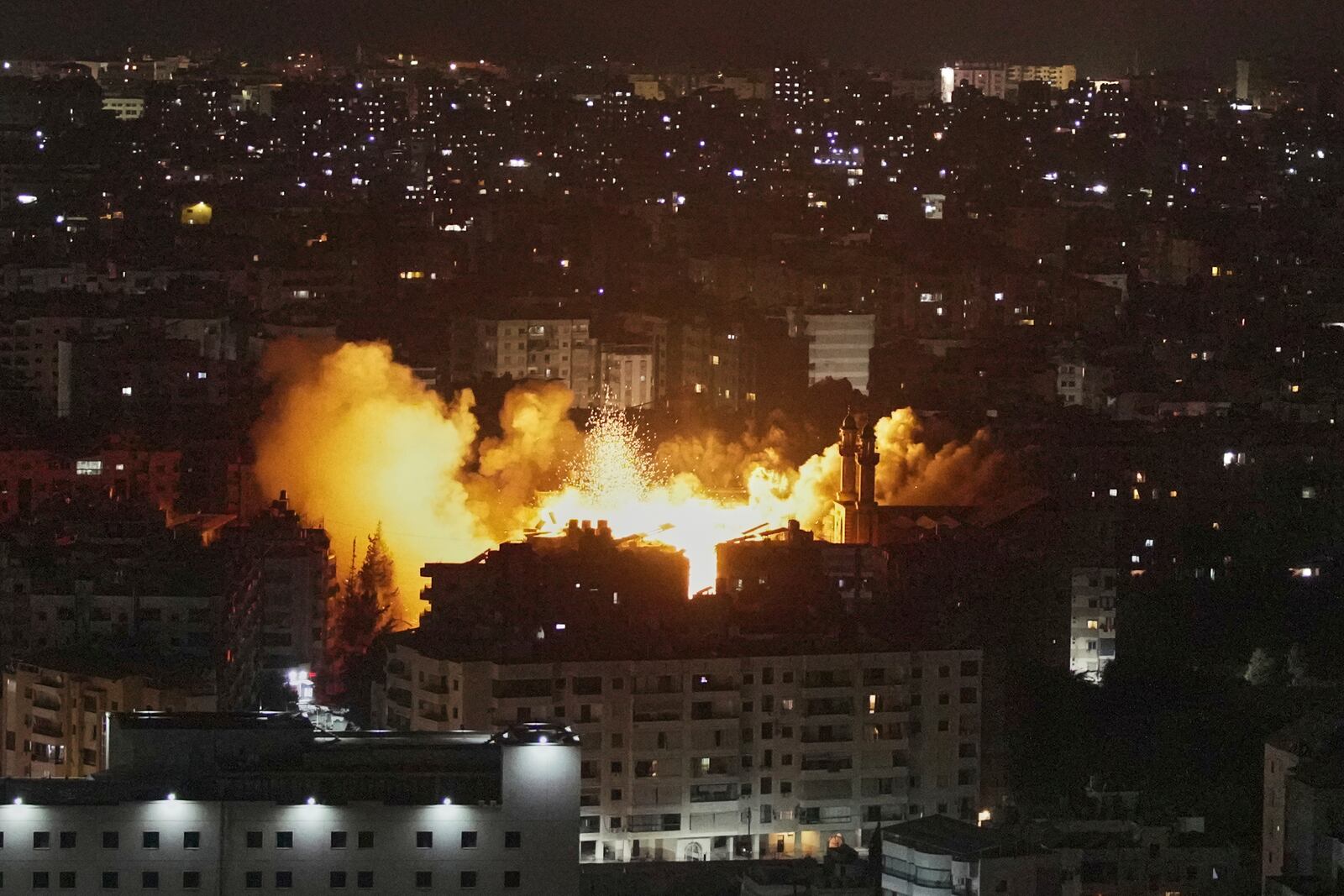 Flames and smoke rise following an Israeli airstrike on Dahiyeh in the southern suburb of Beirut, Lebanon, Thursday, June 5, 2025. (AP Photo/Hassan Ammar)