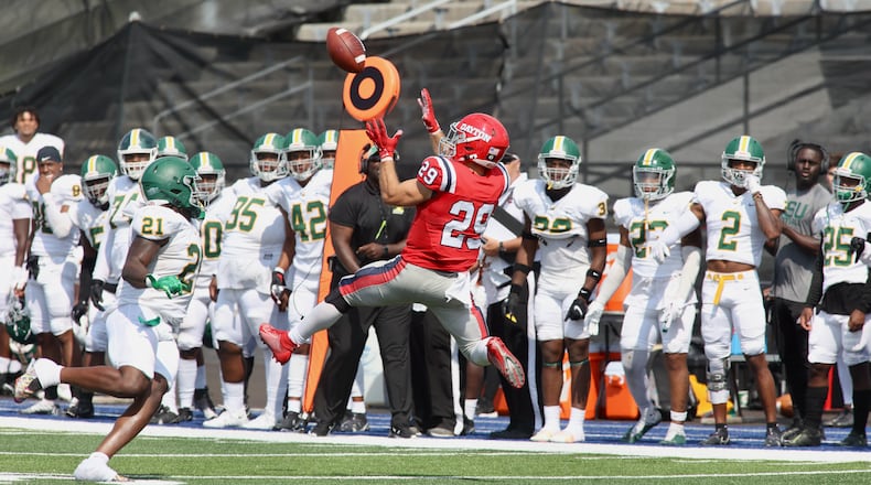 Dayton's Jake Chisholm makes catch and runs for a touchdown against Kentucky State in the third quarter on Saturday, Sept. 17, 2022, at Welcome Stadium. David Jablonski/Staff