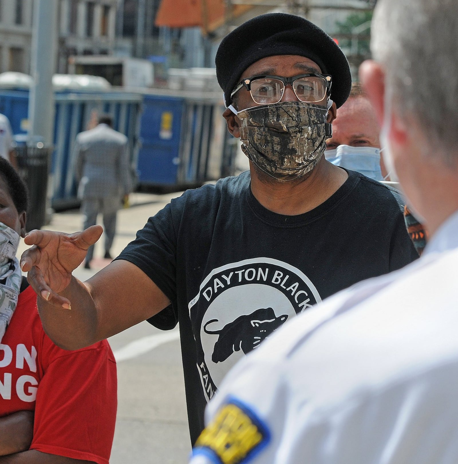 Donald Domineck, chair of the Dayton chapter of new Black Panthers, ask questions to Dayton Police Chief, Richard Biehl, during a press conference at City Hall in June. MARSHALL GORBYSTAFF