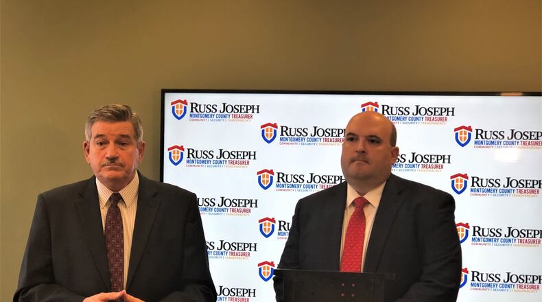 Montgomery County Auditor Karl Keith and Treasurer Russ Joseph discussed two ways they plan to help tornado victims with their property taxes. CORNELIUS FROLIK / STAFF